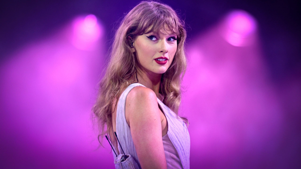 Taylor Swift’s Hair Ribbon is Feeling 22 Feet Long—See the Photos